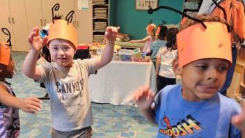 young kids dressed as Monarch butterflies